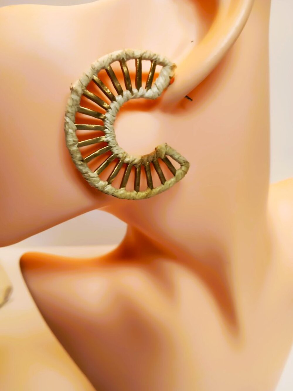 Earrings, pierced, semi-circle hoops, woven raffia and gold=tone metal.